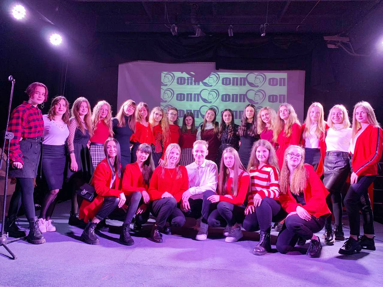 Щасливі студенти з куратором після посвяти